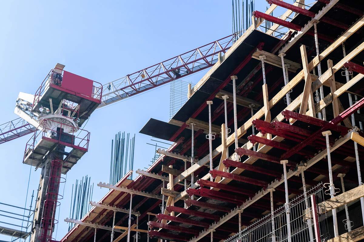 Layanan 12 construction site with crane on sky background 8S9WTA8