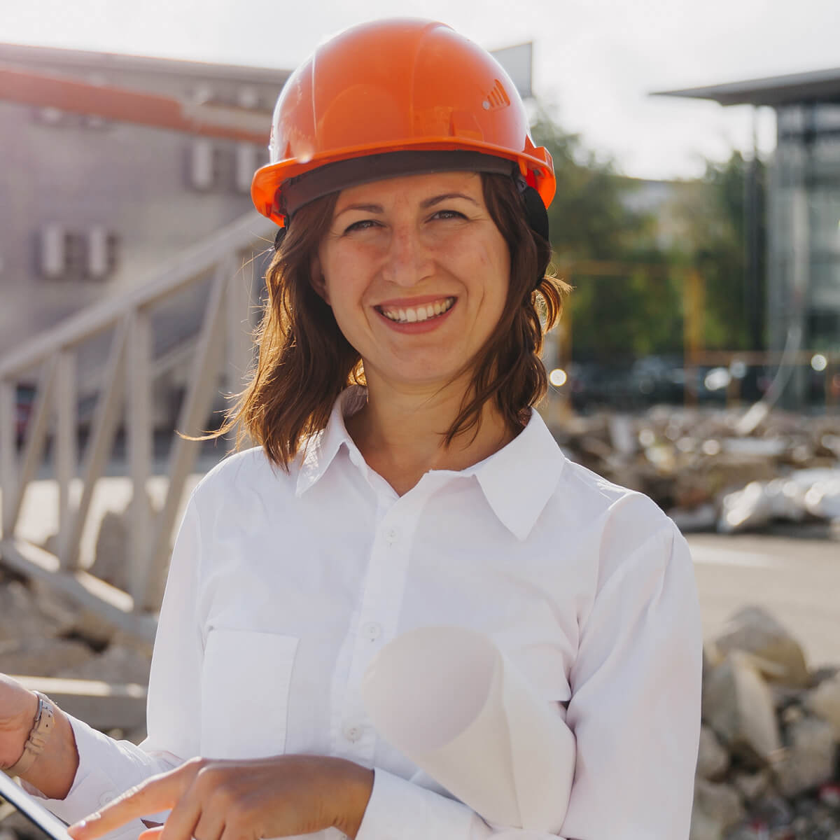 young beautiful woman architect in white shirt and UVLRPES