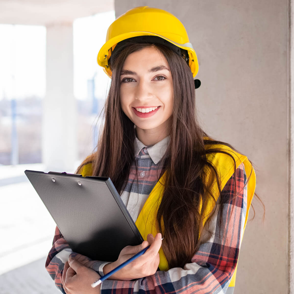 young female engineer at a construction site UH6D5RZ